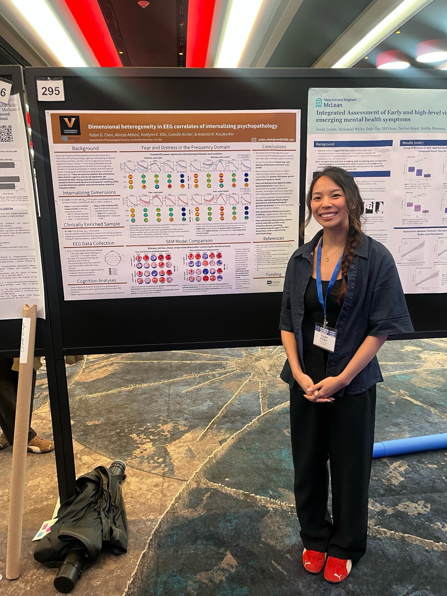 Graduate student, Yulan Chen, presenting her poster "Dimensional heterogeneity in EEG correlates of internalizing psychopathology."